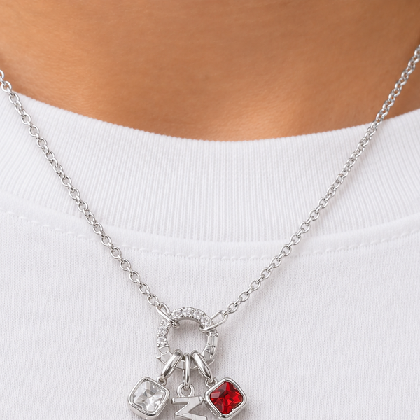 Necklace with 'MAMA' pendant on a white background