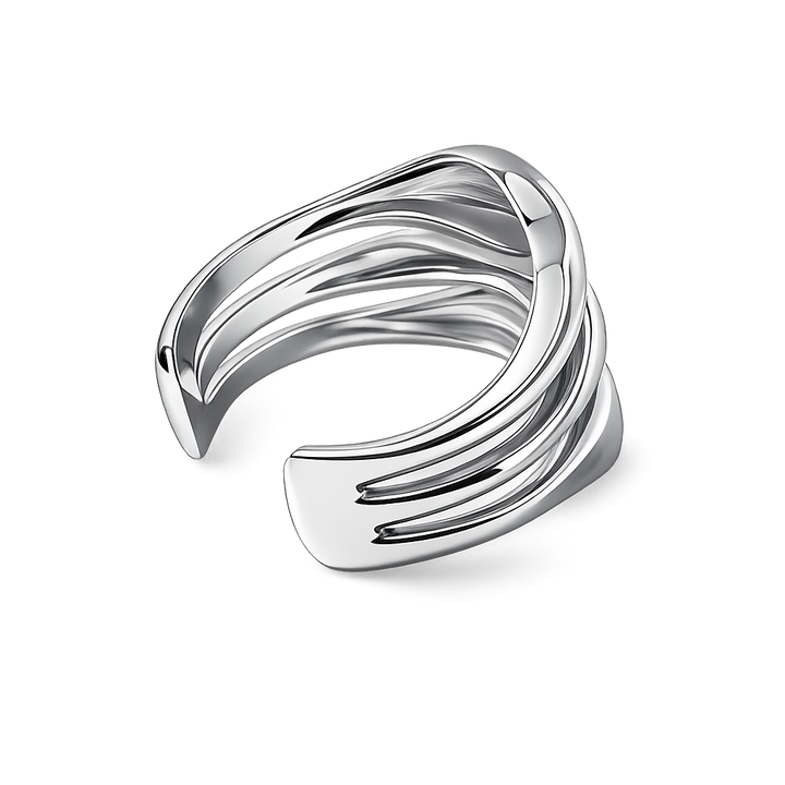 Silver bangle with a wavy design on a white background