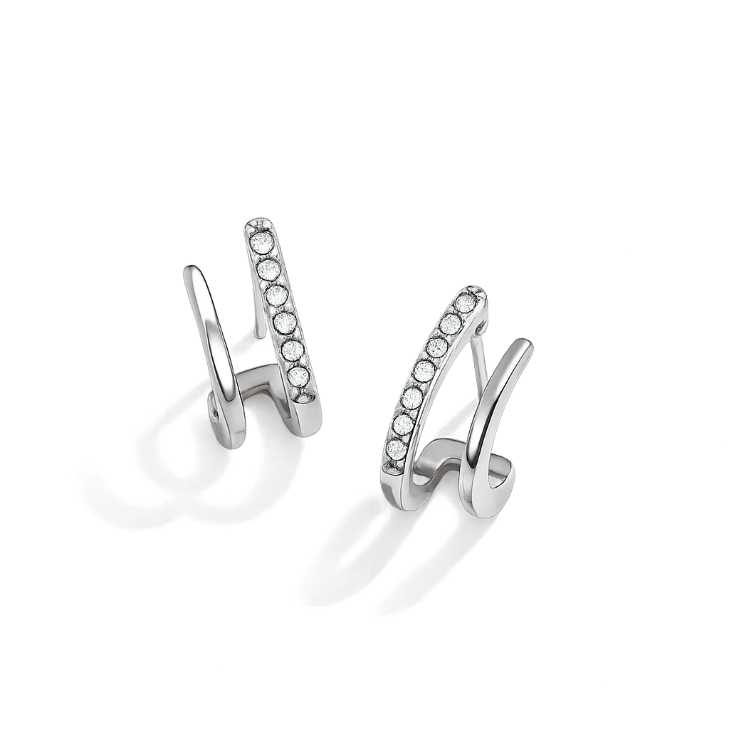 Pair of silver hoop earrings with embedded stones on a white background