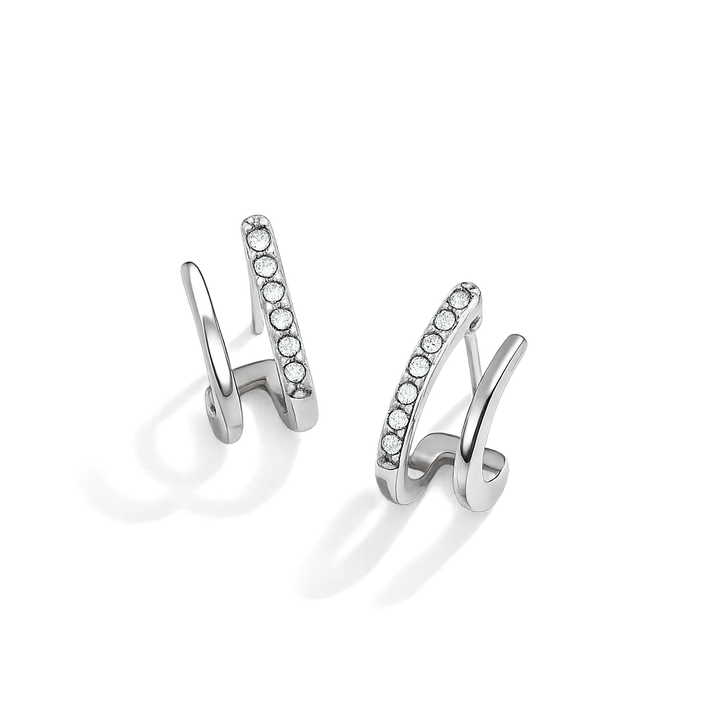 Pair of silver hoop earrings with embedded stones on a white background