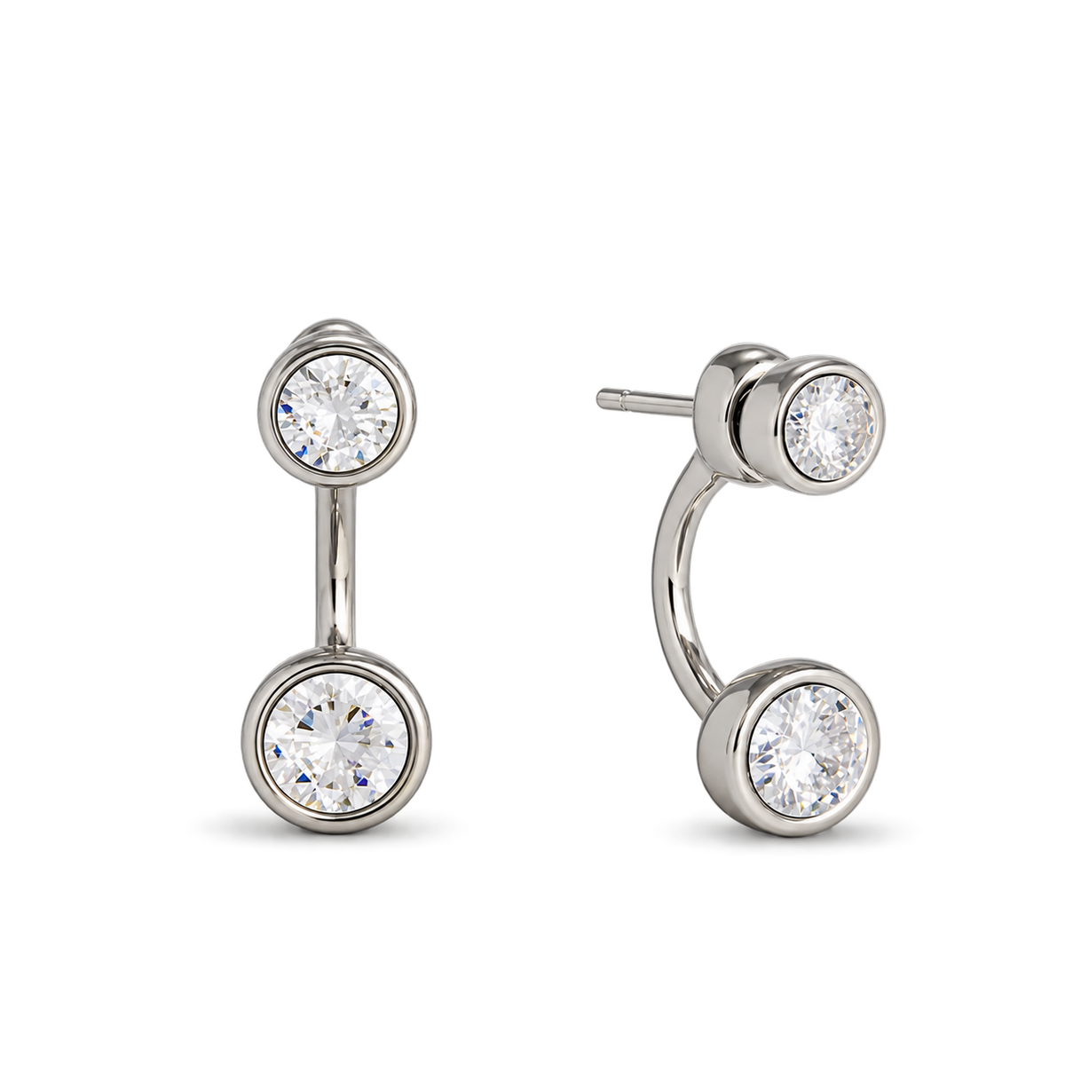 A pair of silver-toned labret and hoop earrings, each featuring a round clear gemstone in a bezel setting. One earring is shown facing forward and the other is angled to show the side profile and post.