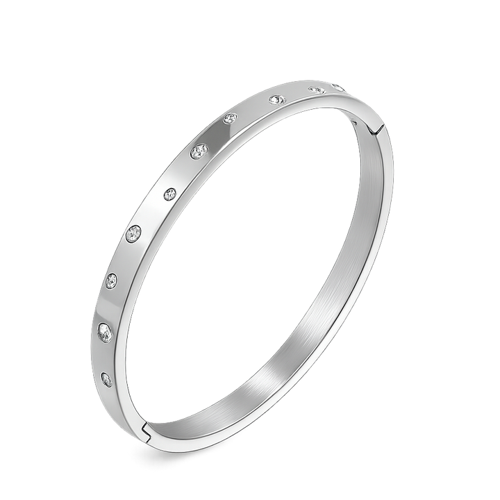 Silver ring with small diamonds on a white background