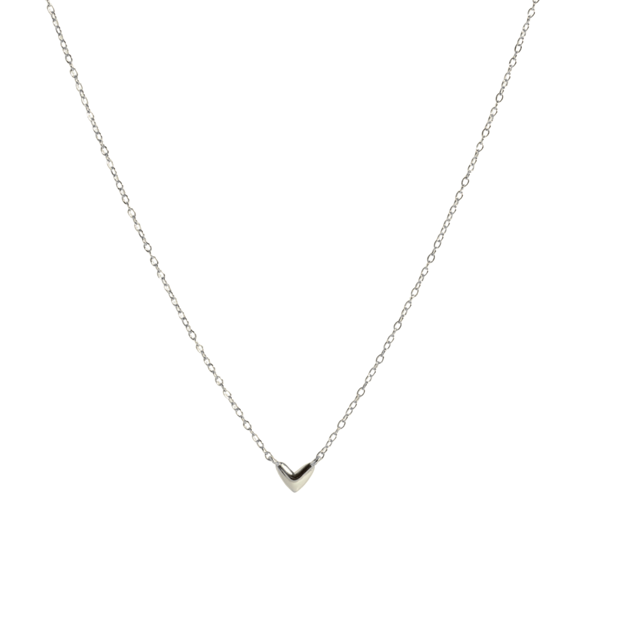 A delicate silver chain necklace with a small, polished silver heart pendant, displayed against a solid white background.