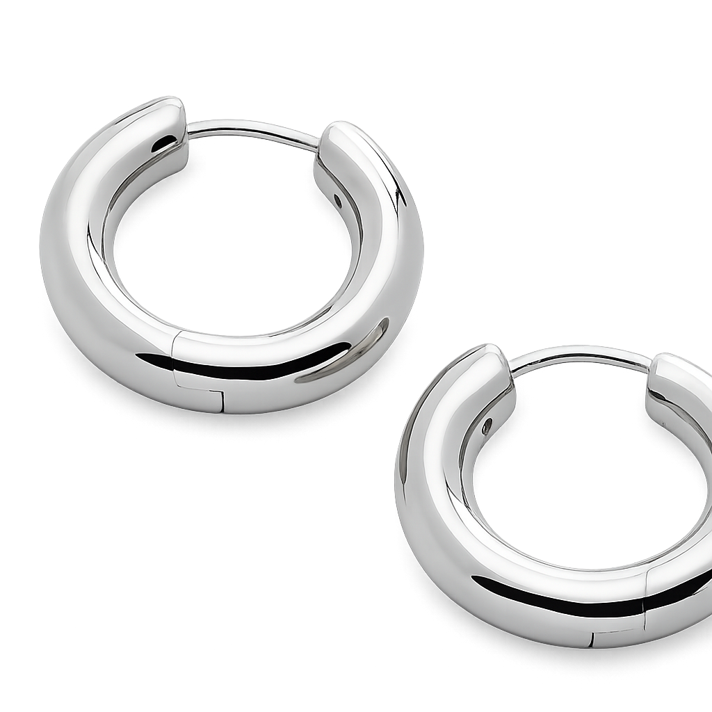 Pair of silver hoop earrings on a white background