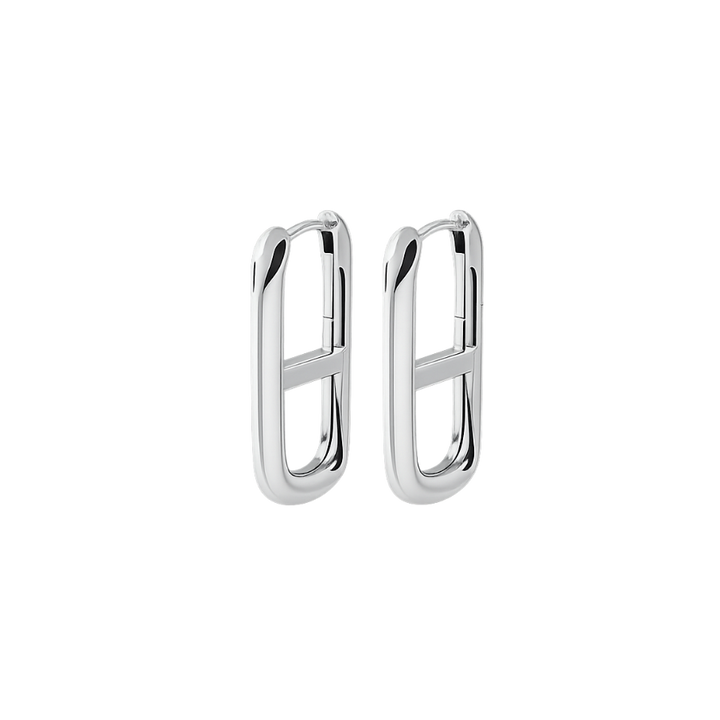 Pair of silver hoop earrings on a white background