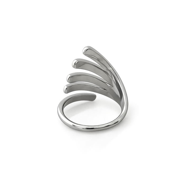 Silver ring with multiple curved bands on a white background