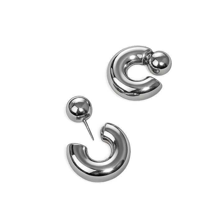 Pair of silver earrings on a white background