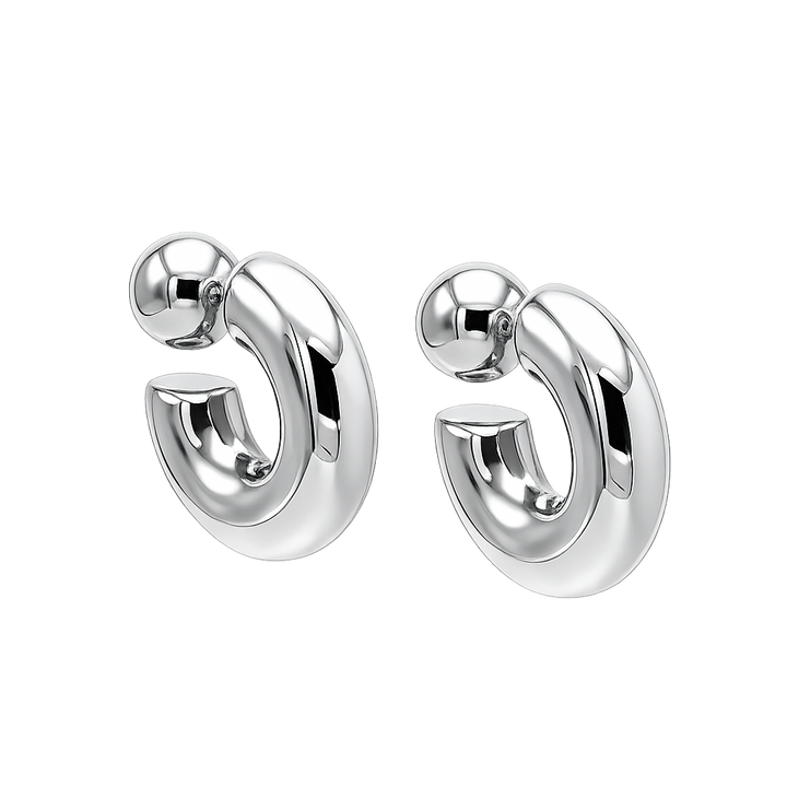 Pair of silver hoop earrings on a white background