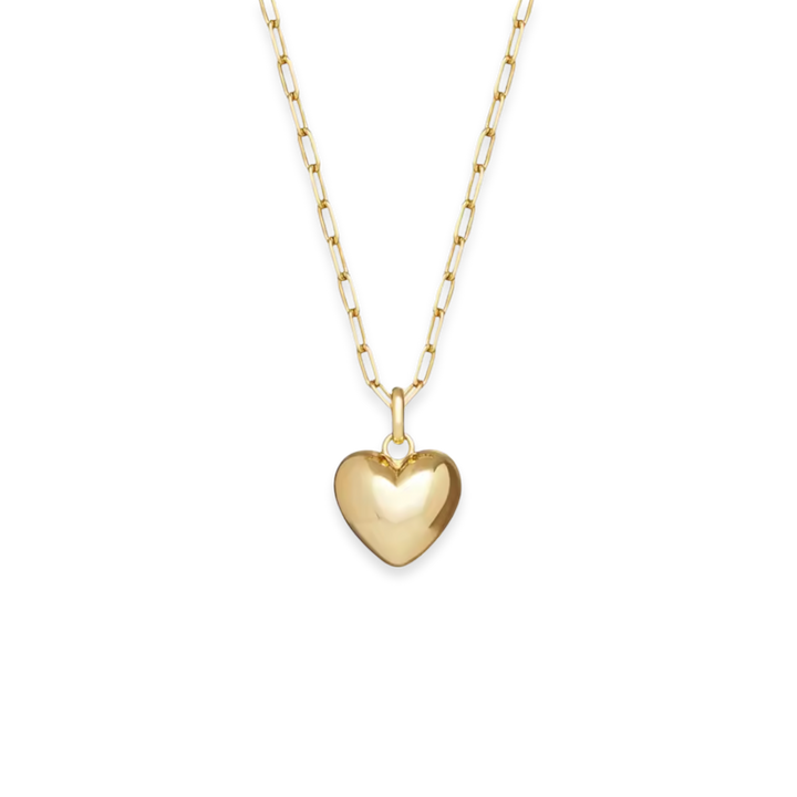 A polished yellow gold heart pendant necklace on a delicate paperclip chain, shown against a solid white background.
