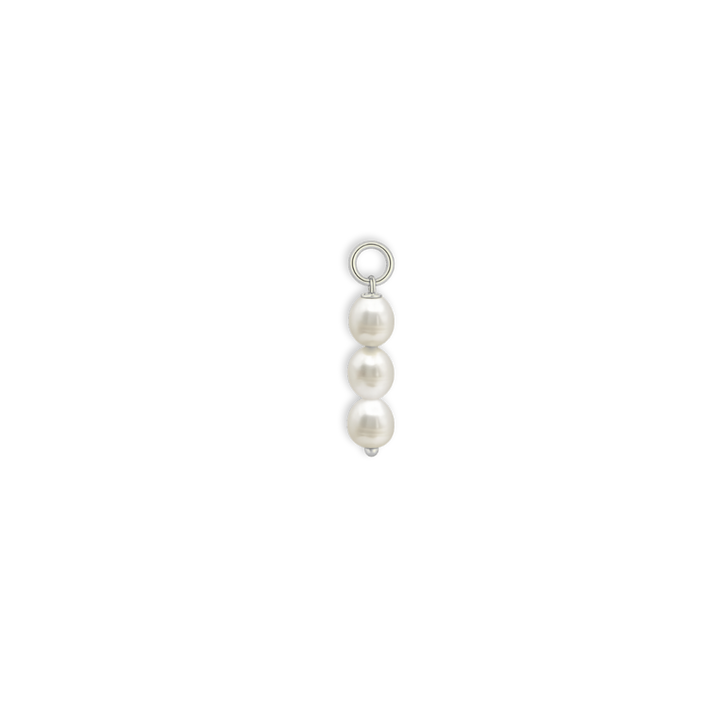 Three pearl charm on a white background