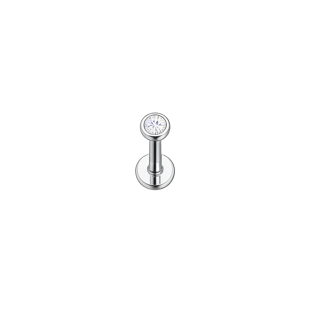 Silver lip ring with a clear gemstone on a white background