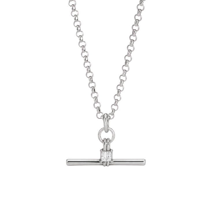 A silver-toned necklace featuring a delicate chain and a horizontal bar pendant with a single square-cut clear gemstone in a prong setting, shown against a plain white background.