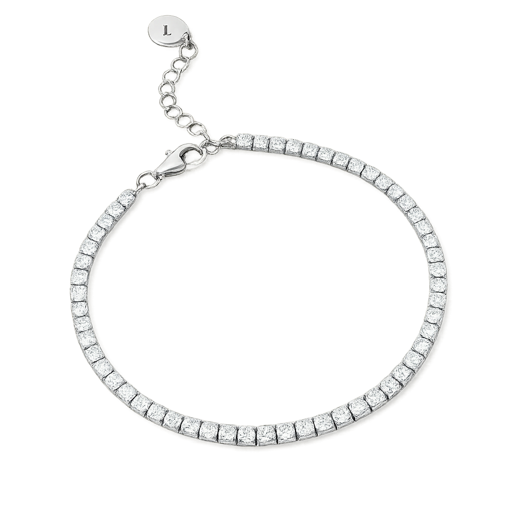 Silver tennis bracelet with clear stones on a white background