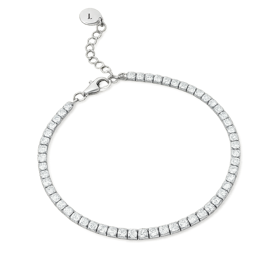Silver tennis bracelet with clear stones on a white background