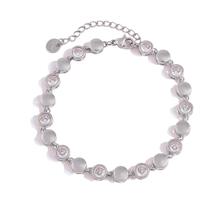 A silver-toned beaded bracelet with alternating smooth round beads and round bezel-set clear crystals, displayed on a clean white background.