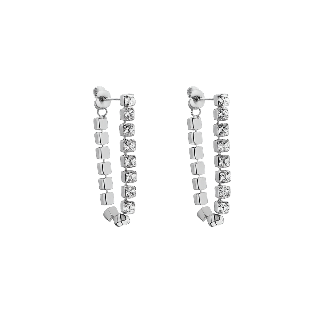 Pair of silver earrings with square beads on a white background