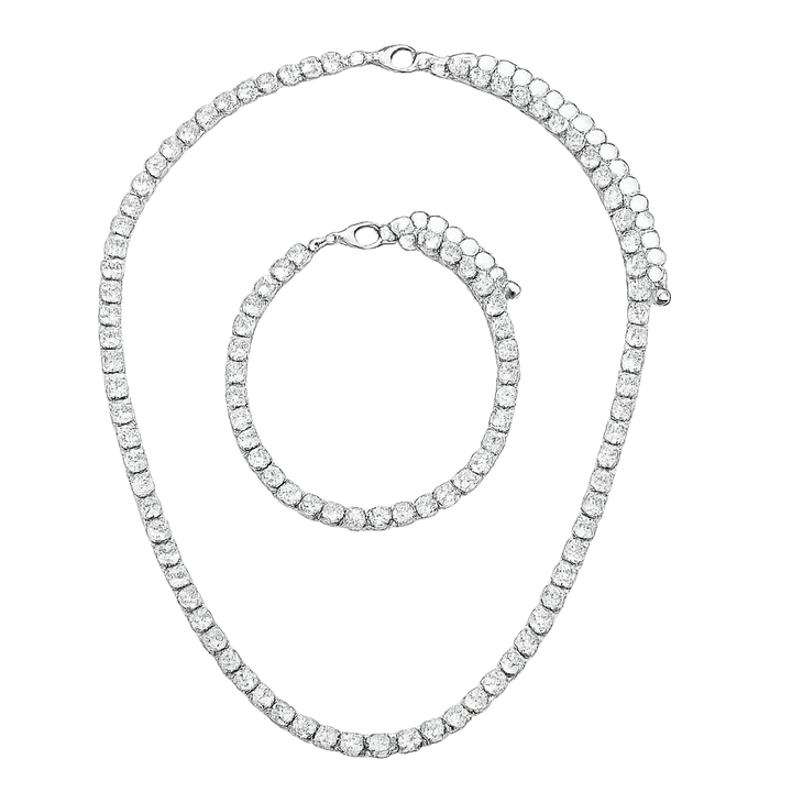 Silver necklace and bracelet set on a white background