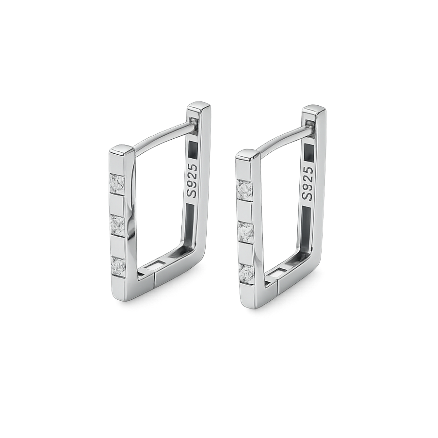 Pair of silver hoop earrings with small diamonds on a white background