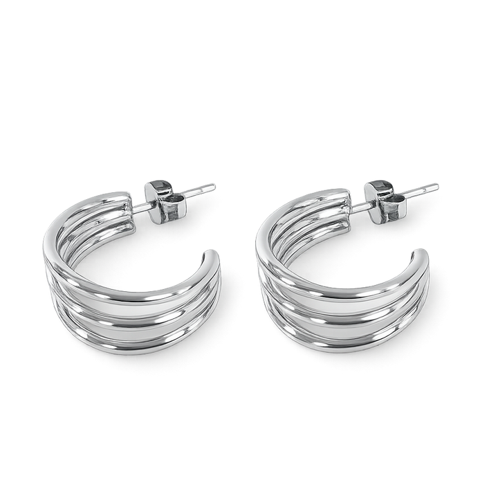 Pair of silver hoop earrings on a white background