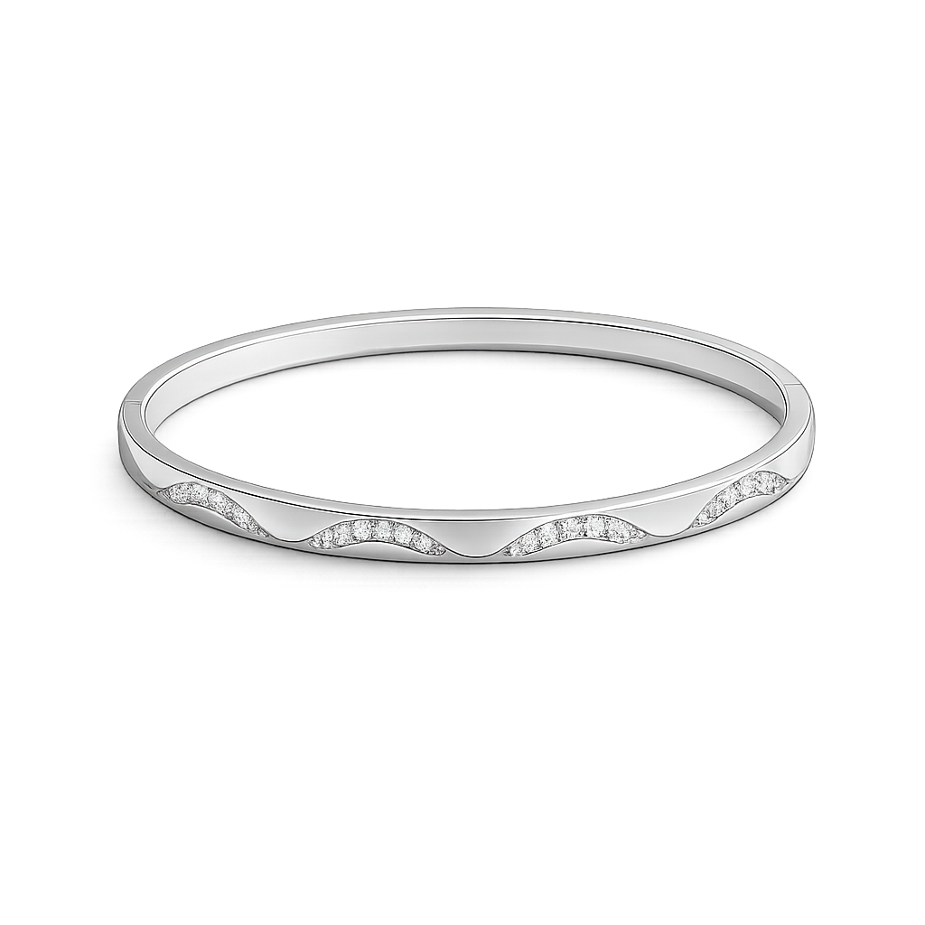 Silver bracelet with a subtle pattern on a white background