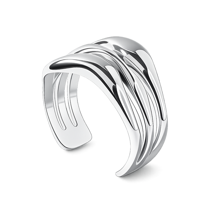 Silver ring with wavy design on a white background