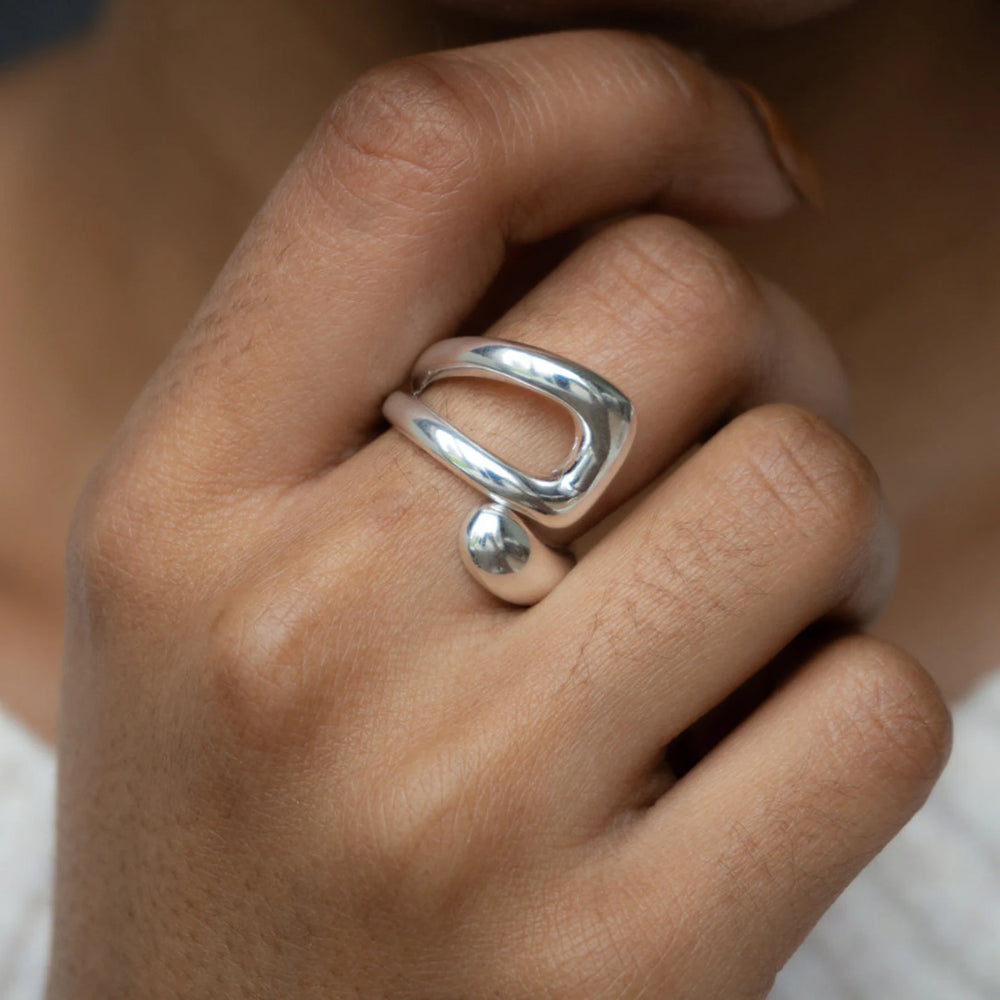 silver ring on hand