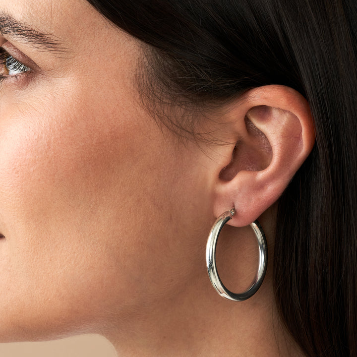 silver hoops on model side view