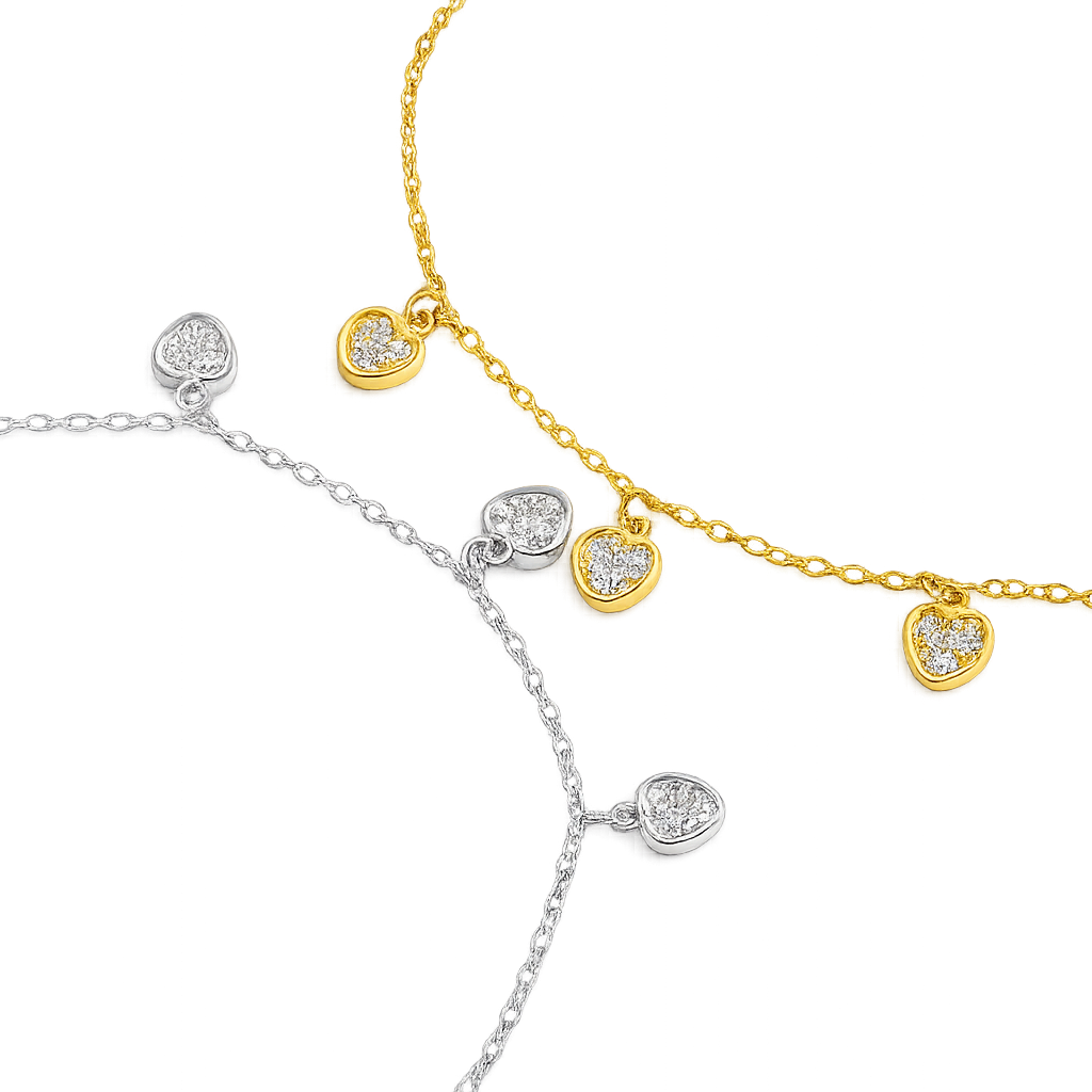 Two gold and silver necklaces with heart-shaped pendants on a white background