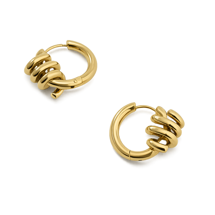 Gold hoop earrings on a white background