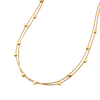 Gold necklace with small round beads on a white background