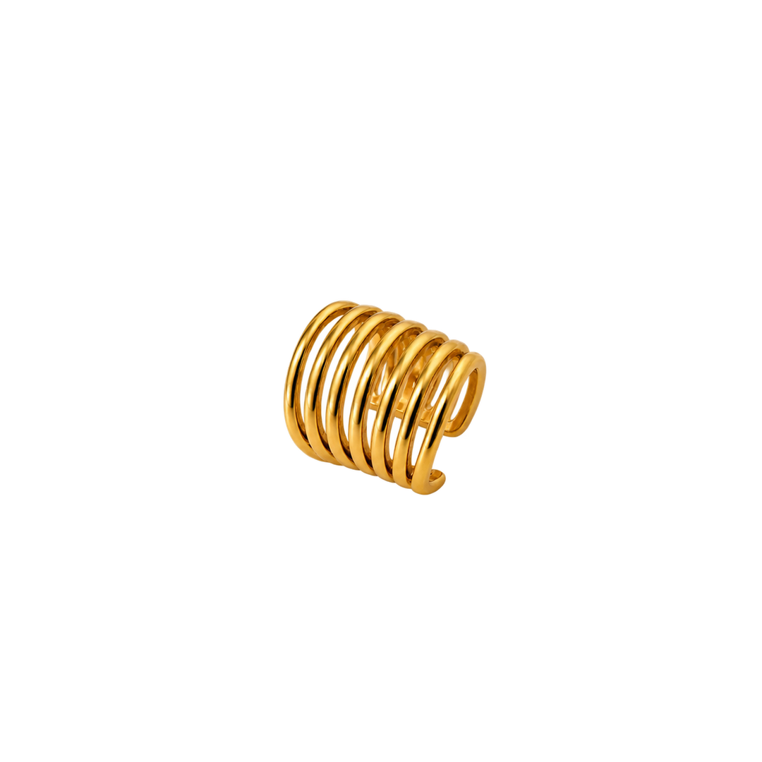 A gold-plated spiral ring with multiple concentric loops, shown on a plain white background.