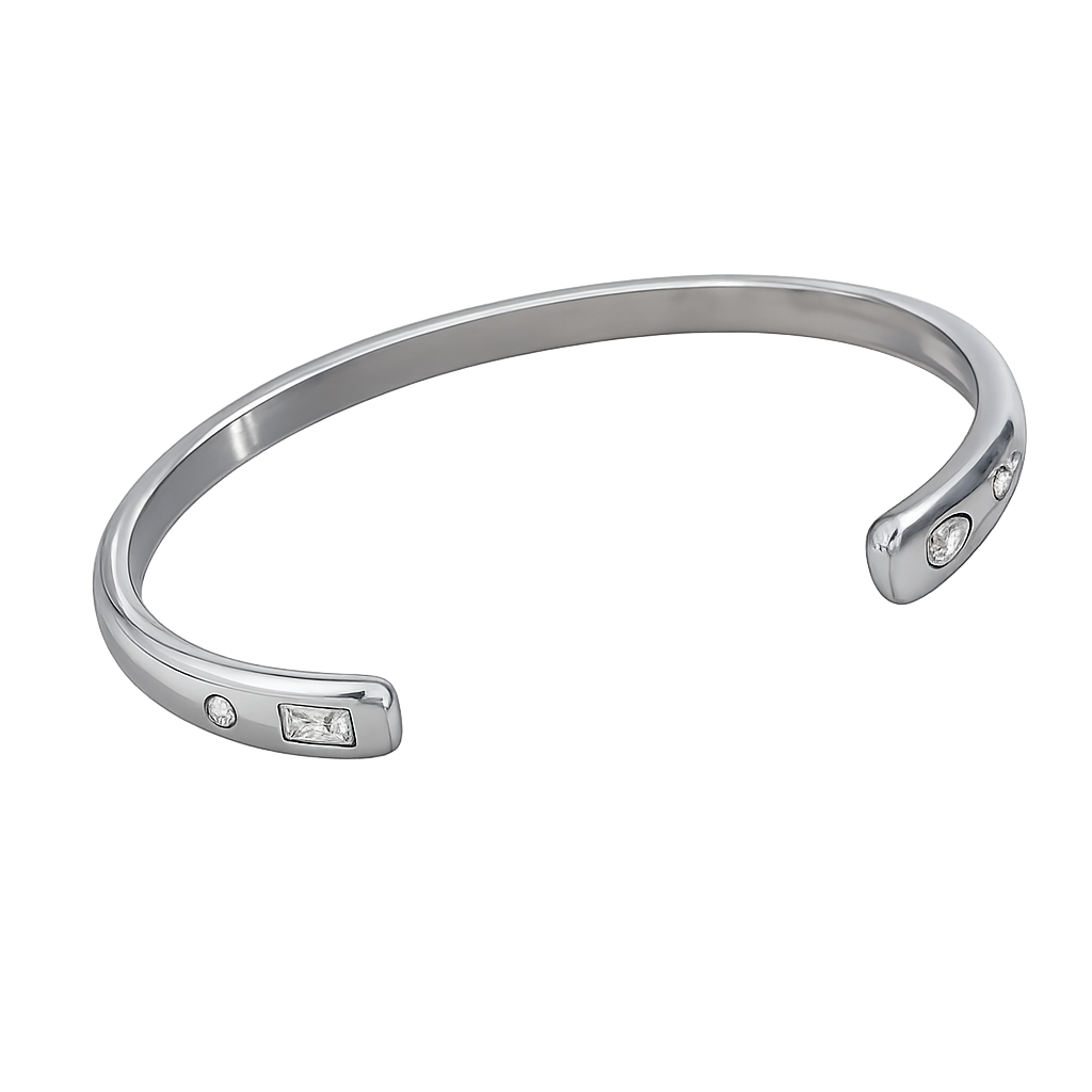 Silver bracelet with embedded stones on a white background