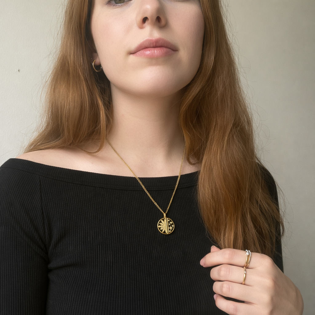 sunburst gold pendant