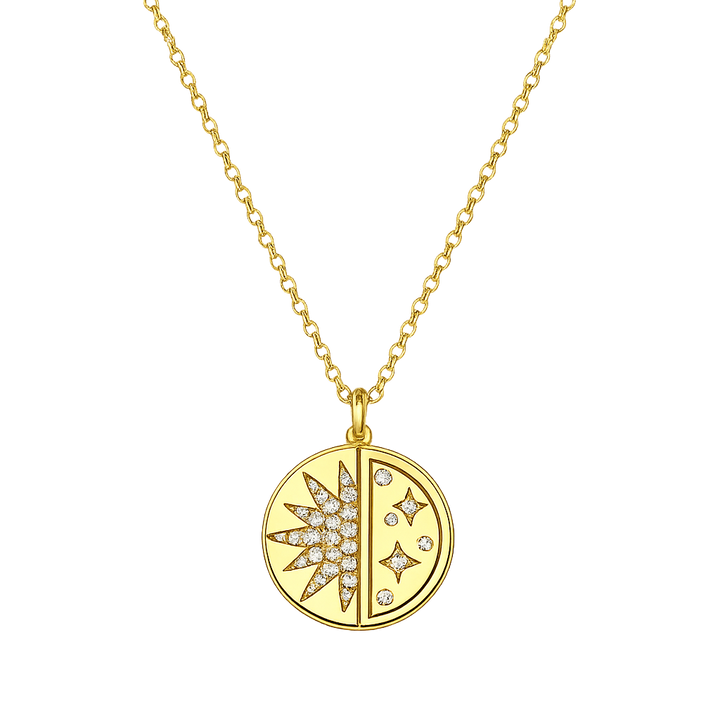 Gold necklace with a circular pendant featuring star designs on a white background
