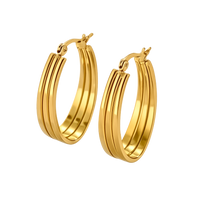 Gold hoop earrings on a white background
