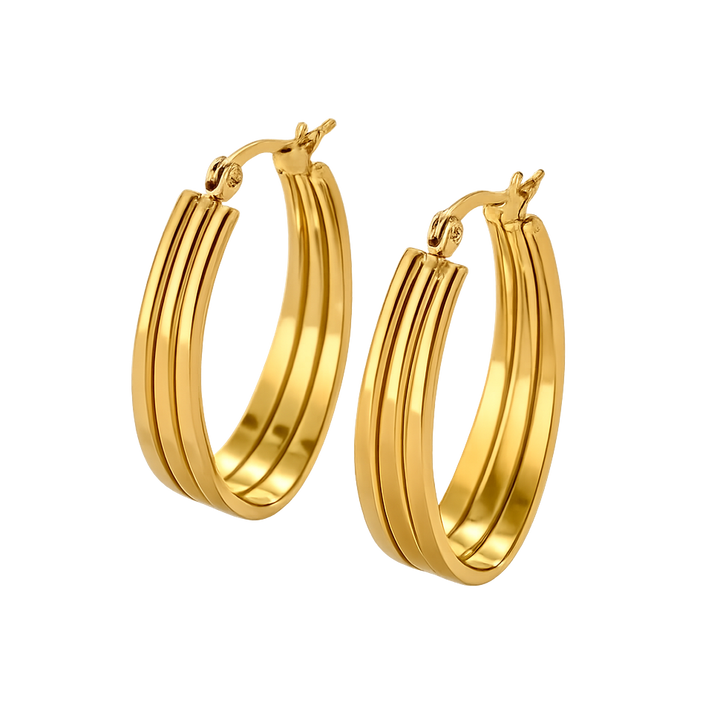 Gold hoop earrings on a white background