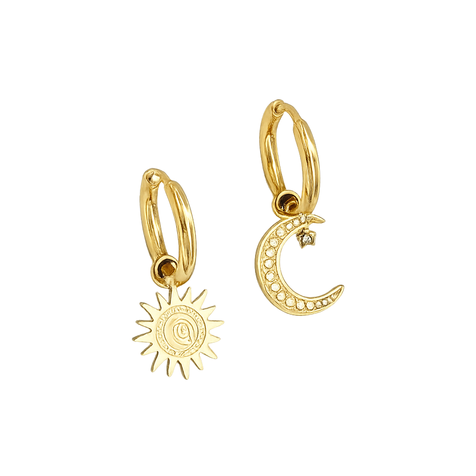 Gold hoop earrings with sun and moon charms on a white background