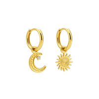 Gold hoop earrings with moon and sun charms on a white background