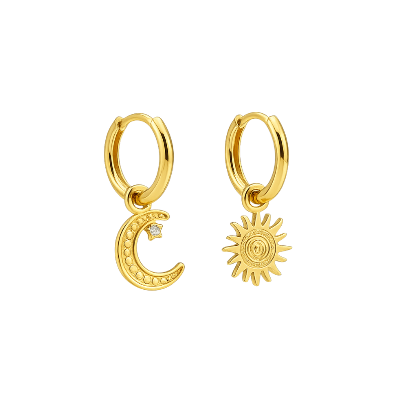 Gold hoop earrings with moon and sun charms on a white background