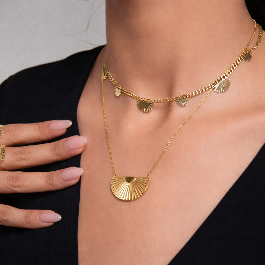 sunset necklace stacked on model