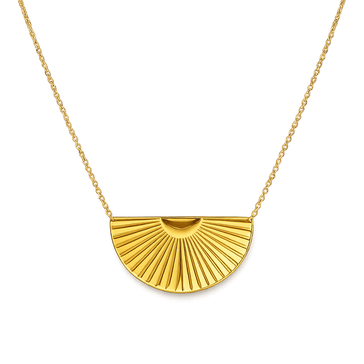 Gold necklace with a half-circle pendant on a white background