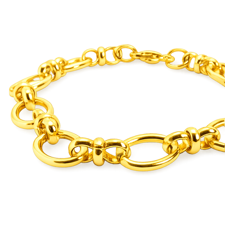 Gold chain bracelet on a white background