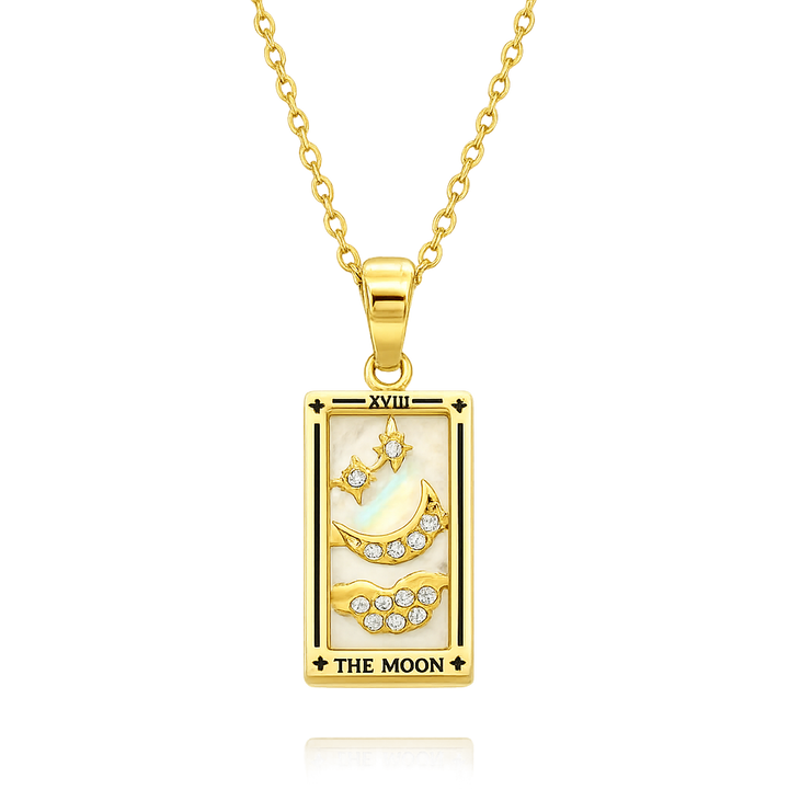 Gold pendant with 'The Moon' tarot card design on a white background