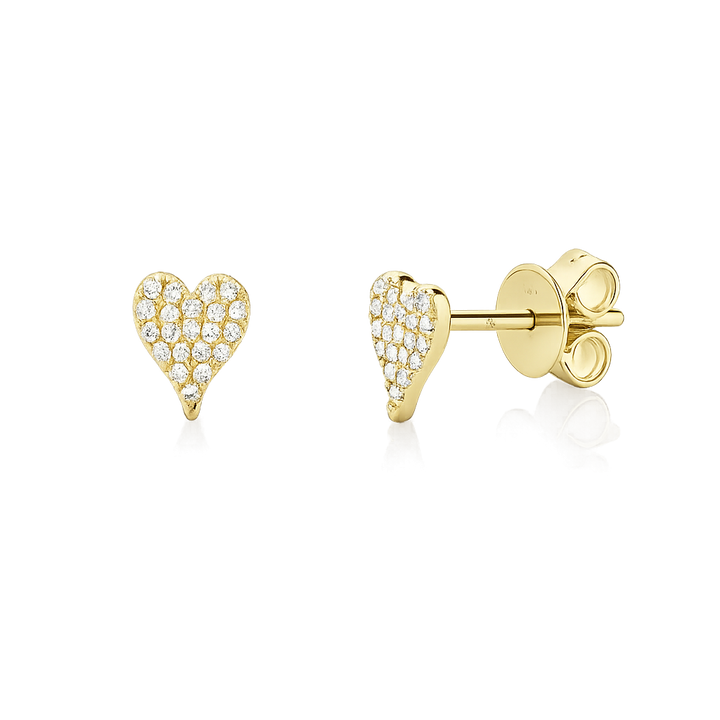 Gold heart-shaped earrings with embedded stones on a white background