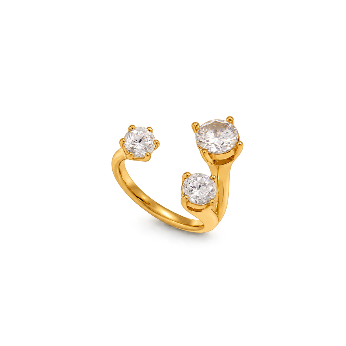 A gold ring featuring three round-cut clear gemstones in a split, open band design, photographed on a clean white background.