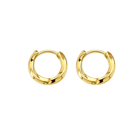 Gold hoop earrings on a white background