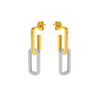 Gold and silver hoop earrings on a white background