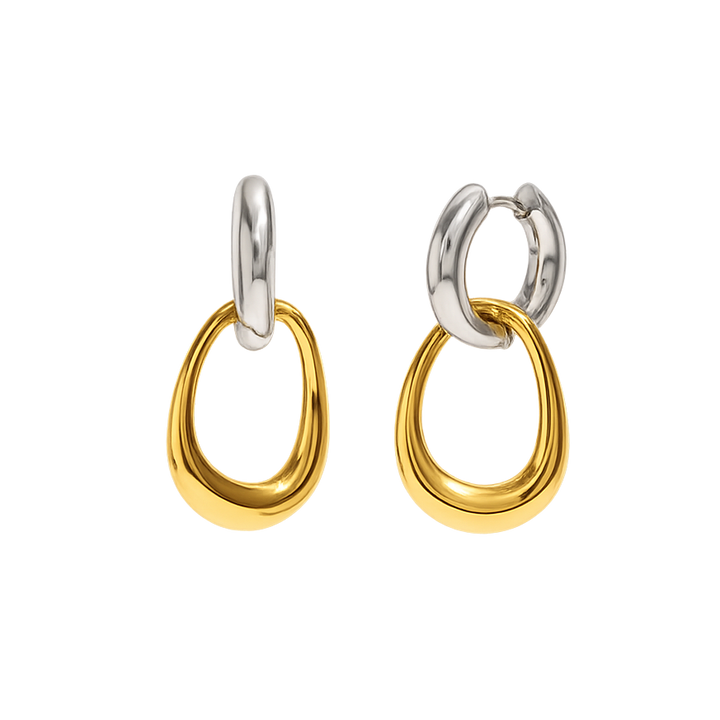 Pair of gold and silver hoop earrings on a white background
