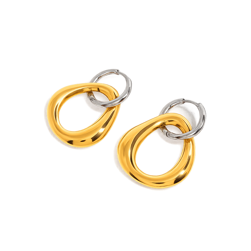 Gold and silver hoop earrings on a white background