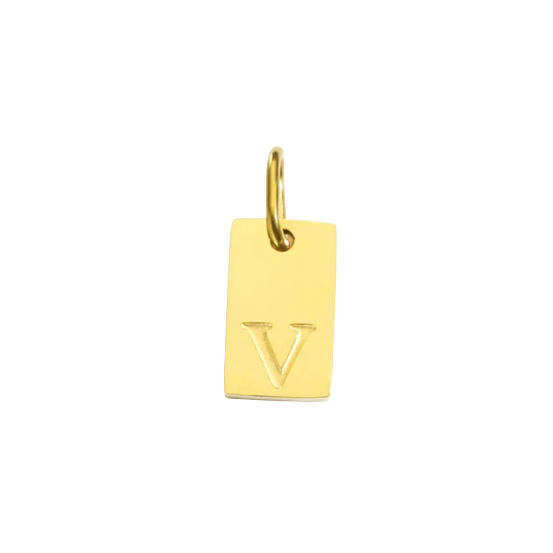 Gold pendant with letter 'V' on a white background